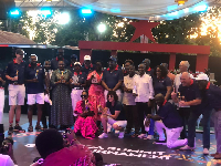 The award-winning golfers posed with dignitaries for a photograph