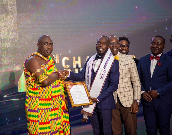 Robert Ayitey (right) receiving a citation at the event