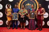 CEO of St John's Hospital, Maame Yea Afriye (M) with some staff at the awards ceremony