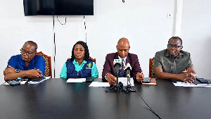 The Bono Regional Director of Health Service, Dr Abdulai Abukari flanked by other health officials