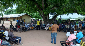 Atta Boateng interacting with the Abamba community