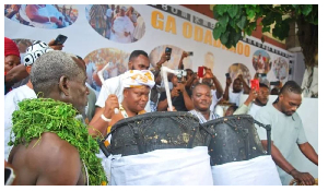 Nii Ayi-Bonte II (1st on drum from left) drumming to lift the ban on noise making