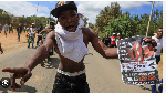 Hundreds of Kenyan youths protest outside the Ebola quarantine