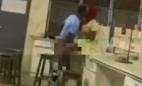 Screenshot from video that captured teacher and student in a compromised position
