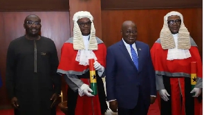 Akufo-Addo and Bawumia with the new justices after the ceremony