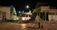 Tunisian police clashes with youth after a boat carrying migrants capsized off the coast