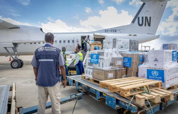 WHO workers in Kenya pack essential medical supplies to support the affected region