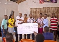 A cheque presented to the Nene Akakposu  Educational fund