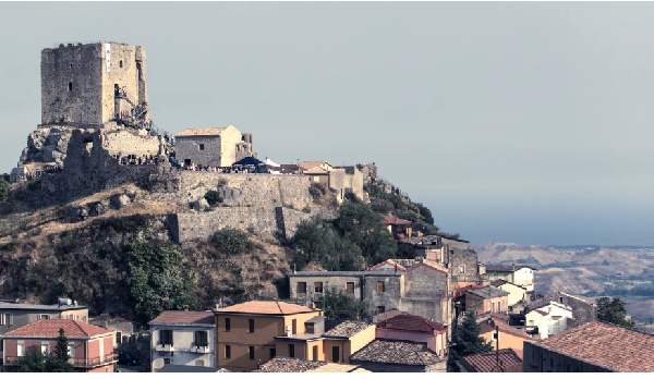 A view of the Castle of Conti D'Aquino and homes in Belcastro, Catanzaro, Italy