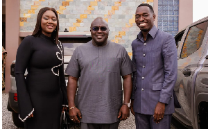 The chief of staff (L) in a photograph with Apostle Sydney Quaye (R)