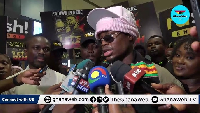 Black Stars winger Fatawu Issahaku (in shades)