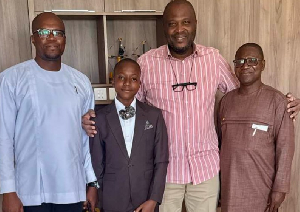 Ibrahim Mahama, second from right with the young student and his family