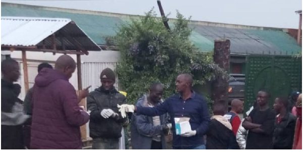 First responders prepare to retrieve bodies at a crash scene following a fatal accident in Kisoro