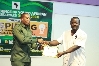 Mr. Kofi Atta Kakra Kusi receiving his citation