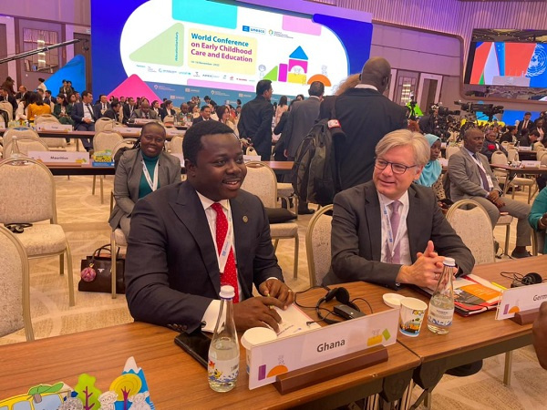 Dep. Minister for Education Rev John Ntim Fordjour with a participant at the UNESCO World Conference