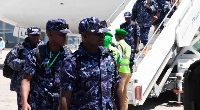 Ugandan soldiers serving under Atmis disembarking from an aircraft