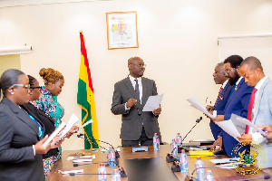 Minister of Finance, Dr Cassiel Ato Forson and members of the newly inaugurated MIIF board