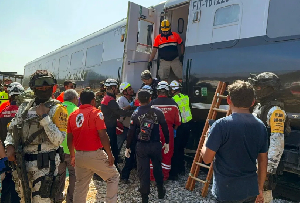 Mexican Army soldiers and Civil Protection members rescue passengers from the Interoceanic train