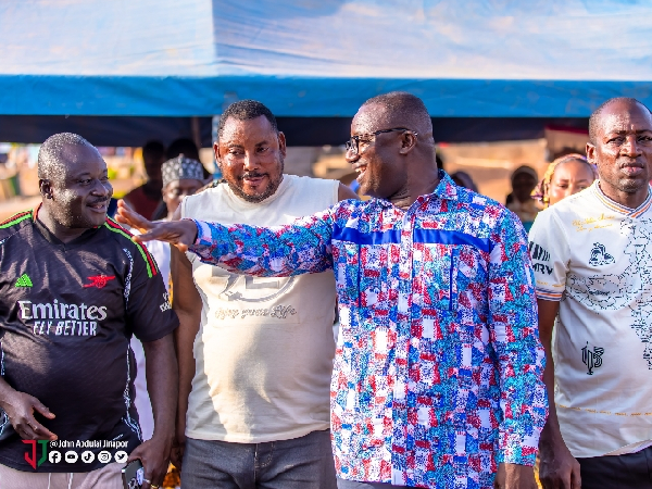 Energy minister (second from R) on his outreach programme Yapei