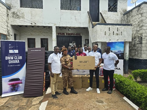 BMW Club Ghana executives presenting the items to Ghana Prisons in Akuse