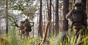 Ukrainian soldiers work during a combat operation on the front line near Kreminna, in the Luhansk