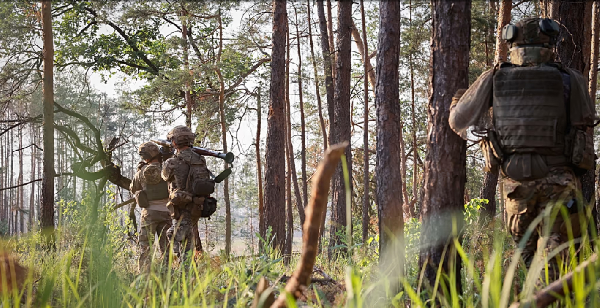 Ukrainian soldiers work during a combat operation on the front line near Kreminna, in the Luhansk