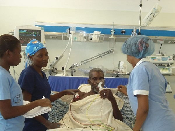 A picture of some nurses attending to a patient