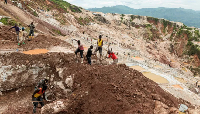Labourers dig at the Rubaya coltan mine in the town of Rubaya