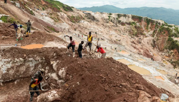 Labourers dig at the Rubaya coltan mine in the town of Rubaya