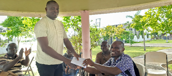 Shaibu Daudu alias Vandasco, Personal Assistant to Ellembelle MP making the presentation