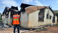 A file photo showing the aftermath of a house destroyed by fire