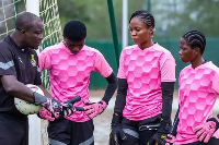 Former Hearts of Oak goalkeeper James Tetteh Nanor in a conversation with some female goalkeepers