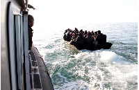 Migrants and refugees are stopped by the Tunisian Maritime National Guard at sea near Sfax