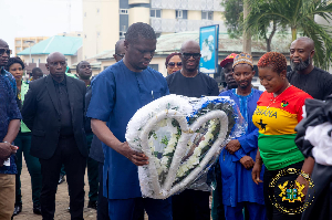 The Minister of Sports lays a wreath