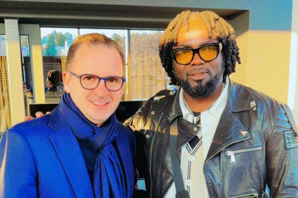 Prince Tagoe and Predrag Mijatović, Vice President for Sporting Affairs for Partizan Belgrade