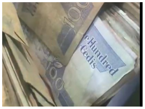 Screenshot from Askghmedia X video of old cedi notes from 40 years savings