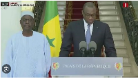 Dressed in white in these photos taken at his inauguration, former central banker Ahmadou Al Aminou