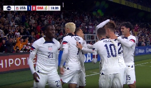 A jubilant US team celebrates one of their goals