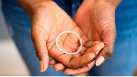 A woman holds a diaphragm vaginal contraceptive ring