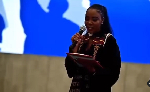 Dr. Paulina Denteh delivering a speech during her graduation ceremony