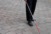 The white cane is a tool used by the visually impaired