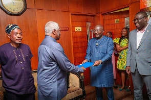 Fred Oware presenting the nomination form to Dr Mahamudu Bawumia