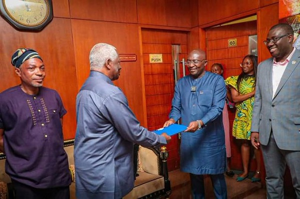 Fred Oware presenting the nomination form to Dr Mahamudu Bawumia