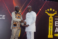 Dr Kingsley Agyemang (R), receiving his award