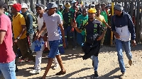 Workers began emerging from the mine on Wednesday morning