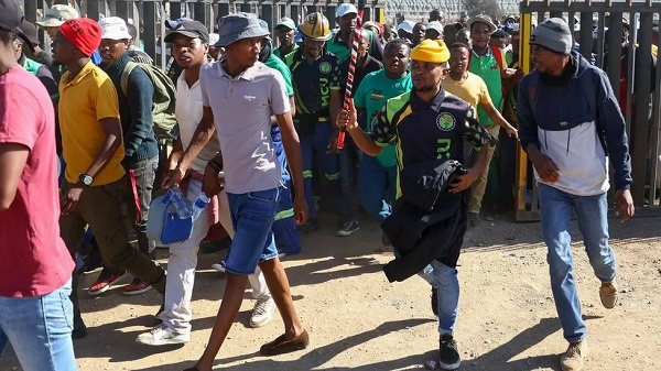 Workers began emerging from the mine on Wednesday morning