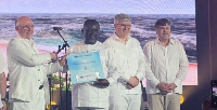 Minister of Transport, Kwaku Ofori Asiamah (3rd from left) receiving the award