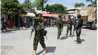 Kenyan police officers patrol as part of a peacekeeping mission, in Port-au-Prince, Haiti