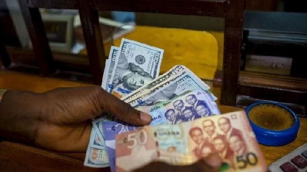 File photo of Cedi and US Dollar notes