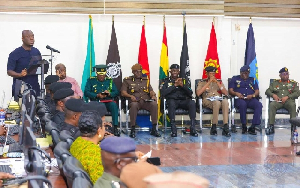 Dr Serebour Quaicoe seated with the service chiefs at the meeting held in Accra